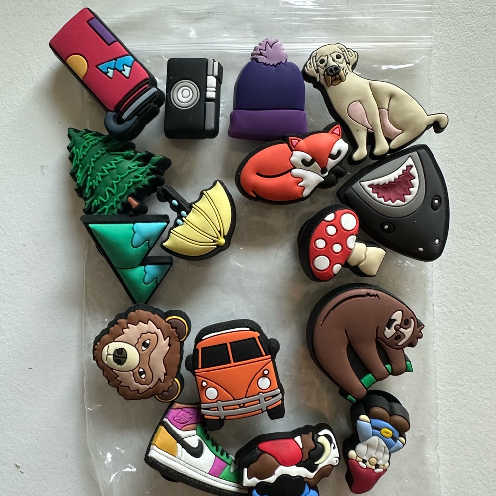 Lot of random croc Charms, butterflies, Taylor swift, animals and more